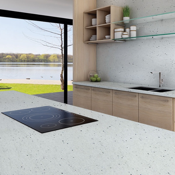 white speckled granite with bleached cabinet